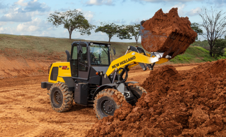 pá carregadeira new holland construction W12D em campo